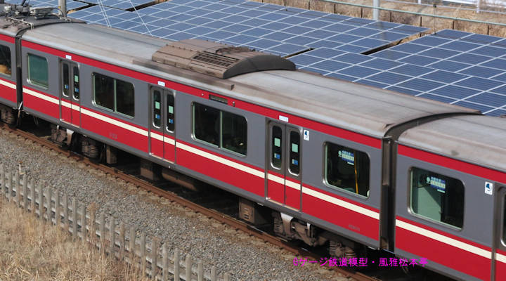 京浜急行電鉄サハ1123。2017年(平成29年)3月、北総鉄道千葉ニュータウン中央(ちばにゅーたうんちゅうおう：千葉県印西市)駅＝印西牧の原(いんざいまきのはら：千葉県印西市)駅間にて俯瞰気味に撮影。